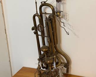 Parlor- Oscar Pumpin “Yellow Brick Road” sculpture