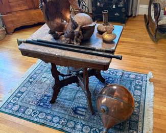 Living Room-Marble top table, Balinese carved sculpture, canes, copper piece