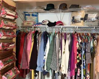 E closet of clothing, ribbon, art supplies