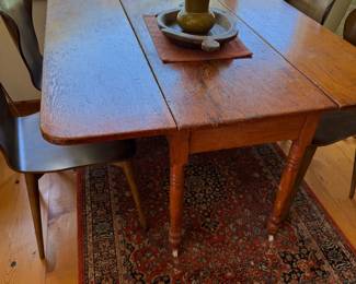 Antique drop leaf table on casters $1500