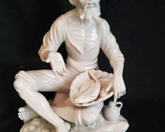 Crown N Dresden White Porcelain Seated Fisherman Figurine