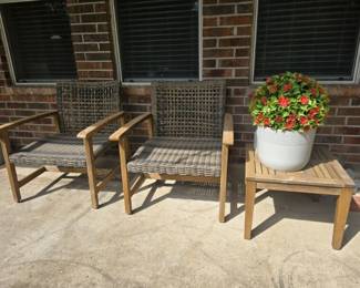 Christopher Knight Home Hampton outdoor club chairs feature a natural stained acacia wood frame and grey wicker seating