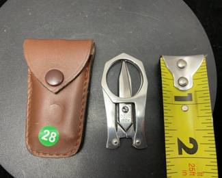 Dovo folding scissors in sheath
