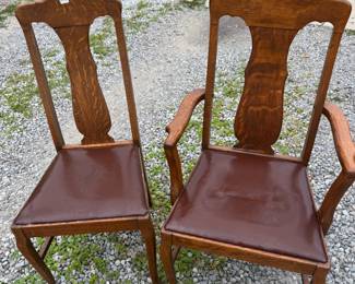Oak dining chairs with leather seats. Good condition