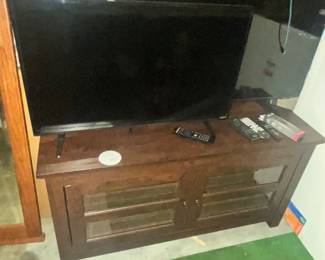 LOW TV STAND AND A PAIR OF NICE TV'S