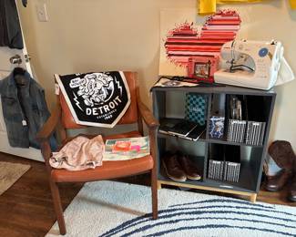 Wooden Shelf, Sewing Machine, Area Rug, Chair, Clothing