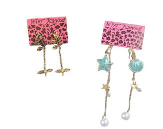Lot 45: Betsy Johnson dangling earrings with leaf and marine charms