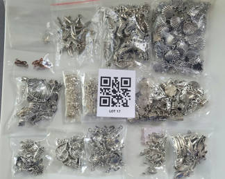 Lot 17: Assorted metal charms and jewelry findings