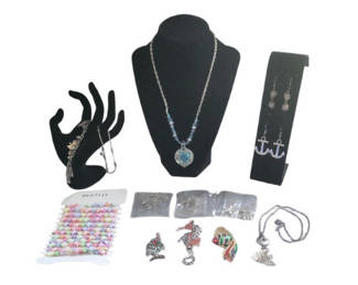 Lot 48: Assorted Jewelry Collection: necklaces, bracelets, earrings, and pendants
