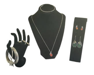 Lot 37: Assorted silver jewelry set: bangles, rings, necklace, and earrings