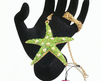Lot 43: Betsy Johnson starfish and panda-themed necklace