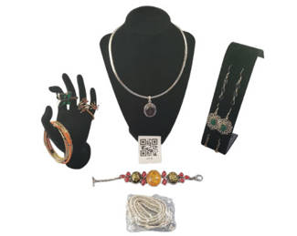 Lot 20: Assorted jewelry: necklace, bracelets, rings, and earrings
