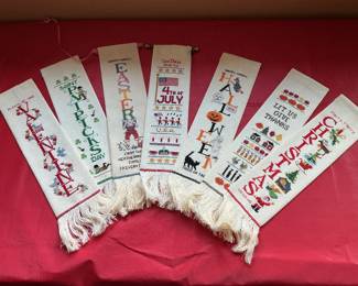 Hand made cross stitched holiday hangings