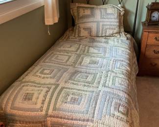 Pair of twin beds with grey wrought iron headboards, mattresses and box spring