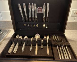 1960s set of Lunt Sterling…pattern is old lace. Five piece place setting of seven