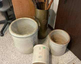 Three crocks in excellent shape, plus vintage brass umbrella stand and several very old walking sticks