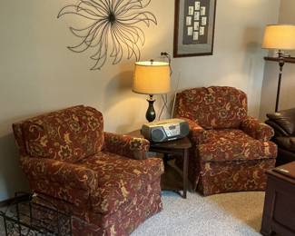 Pair of floral chairs, pr of lamps, triangle shaped end table and metal wall art
