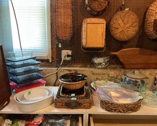Multiple pieces of Pyrex and other glass sets of bakeware.