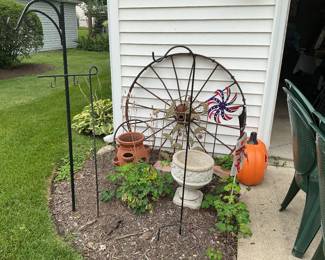 Wagon wheel, hooks, cement pot