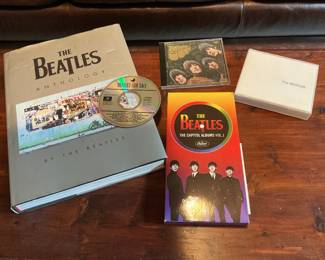 Coffee table Beatles book and Beatles CDs