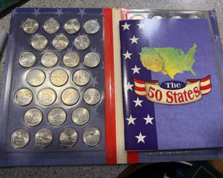 50 state quarters in their display folder