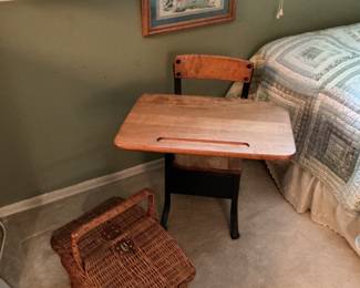 Childrens school desk, basket and artwork