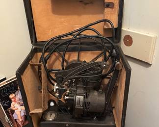 Vintage Belle and Howard Thelmo model 129 16 mm movie projector