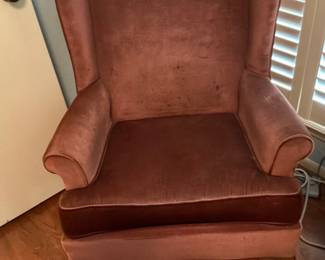 Brown velvet wing back chair