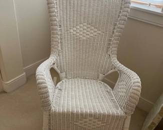 White wicker rocking chair