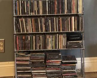 Racks of CDs featuring 60's-90's Rock music plus others
