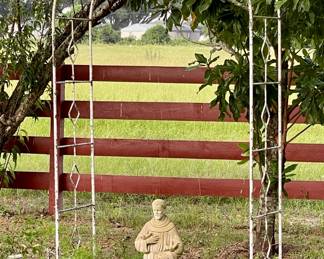 WROUGHT IRON ARBOR, CONCRETE ST FRANCIS STATUE