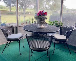 WROUGHT IRON TABLE AND CHAIRS