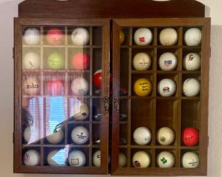 GOLF BALLS IN A WALL SHELF