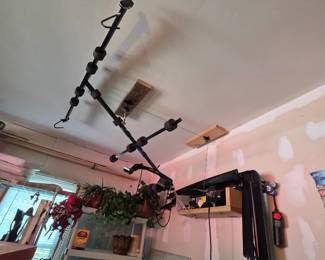 Hoist to lift a jeep cover off.