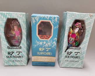 Lot 351  Three vintage Chinese silk figures in original