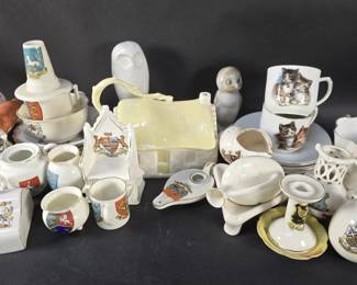 Lot 555  Box of misc knick knacks, tears cups, figurines,