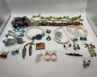 Lot 252h  Group of colorful costume jewelry, bracelets,