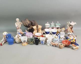 Lot 476  Group of porcelain and ceramic salt and pepper