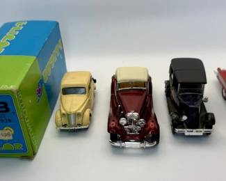 Lot 382h  Group of 5 vintage diecast cars, Eligor and Yatming