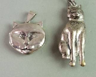 080  Lot 130  Sterling silver cat pendant and pendant locket