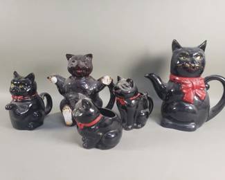 Lot 409  Group of cat figurial teapots, cream and sugars