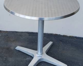 Lot 294  Stainless amd aluminum round table