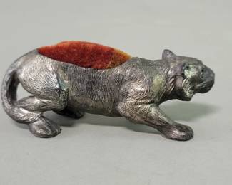 Lot 425  Silver plate panther pin cushion