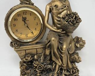 Lot 145  Vintage Goddess tabletop quartz clock