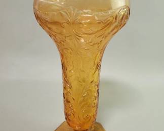 Lot 365  Vintage amber pressed glass pedestal vase with