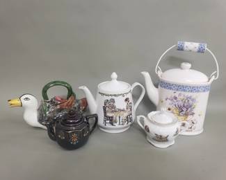 Lot 394  Group of porcelain and ceramic teapots