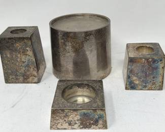 Lot 411  Group of four pottery barn candlestick holders