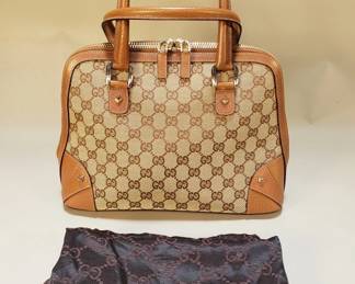 Lot 333  Gucci GG Canvas dome handbag