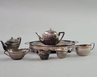 069  Lot 420  Seven piece sterling silver English miniature