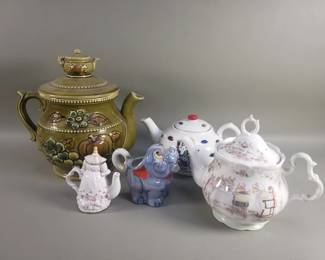 Lot 384  Group of porcelain and ceramic teapots